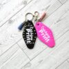 Catching Print Motel Keychain — Funny Cheeky Bag Charm with Studs and Tassel 5 Catching Print Motel Keychain — Funny Cheeky Bag Charm with Studs and Tassel