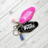 Catching Print Motel Keychain — Funny Cheeky Bag Charm with Studs and Tassel 6 Catching Print Motel Keychain — Funny Cheeky Bag Charm with Studs and Tassel