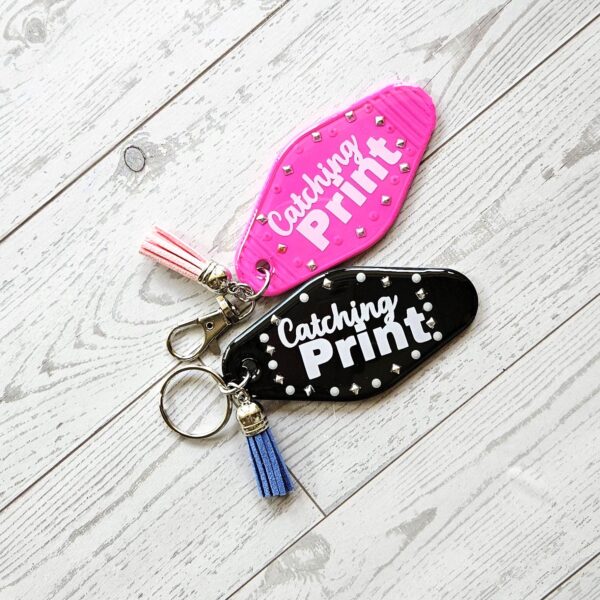 Catching Print Motel Keychain — Funny Cheeky Bag Charm with Studs and Tassel 6 Catching Print Motel Keychain — Funny Cheeky Bag Charm with Studs and Tassel