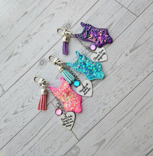 Eras Bodysuit Keychain – Personalized Rhinestone Bag Charm, Pink Blue or Purple 2 Eras Bodysuit Keychain – Personalized Rhinestone Bag Charm, Pink Blue or Purple
