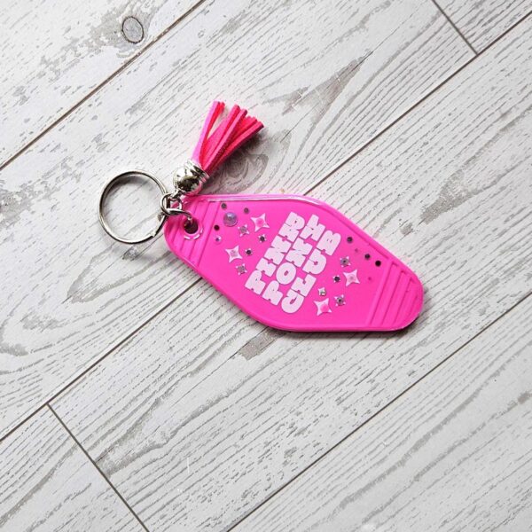 il_fullxfull.7915707817_1eyl Pink Pony Club Motel Keychain — White Pink Rhinestone Tassel Bag Charm