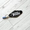 Catching Print Motel Keychain — Funny Cheeky Bag Charm with Studs and Tassel 4 Catching Print Motel Keychain — Funny Cheeky Bag Charm with Studs and Tassel