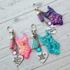 Eras Bodysuit Keychain – Personalized Rhinestone Bag Charm, Pink Blue or Purple 1 Eras Bodysuit Keychain – Personalized Rhinestone Bag Charm, Pink Blue or Purple