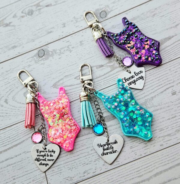 Eras Bodysuit Keychain – Personalized Rhinestone Bag Charm, Pink Blue or Purple 1 Eras Bodysuit Keychain – Personalized Rhinestone Bag Charm, Pink Blue or Purple