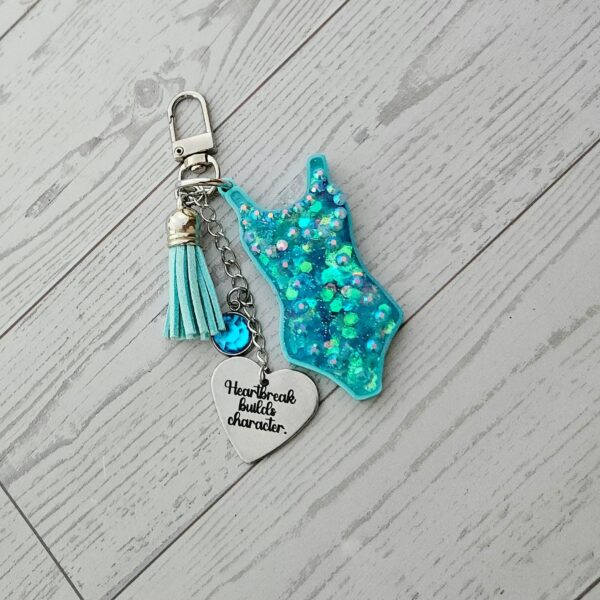 Eras Bodysuit Keychain – Personalized Rhinestone Bag Charm, Pink Blue or Purple 6 Eras Bodysuit Keychain – Personalized Rhinestone Bag Charm, Pink Blue or Purple