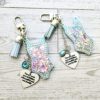 il_fullxfull.7581658020_ejum Showgirl Era Bodysuit Keychain – Glitter Resin Bag Charm, quote accessory