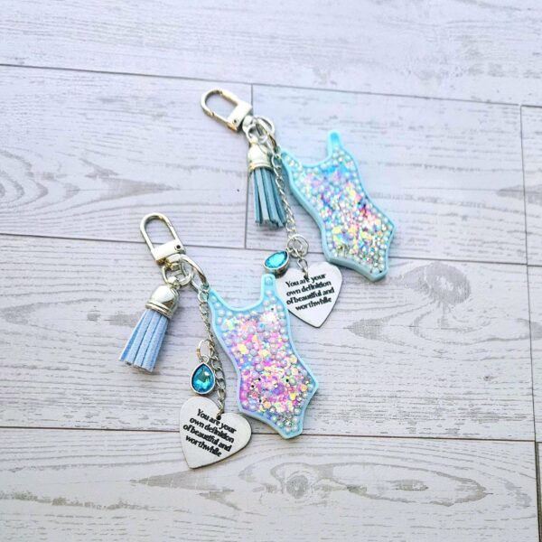 il_fullxfull.7581658170_kvdu Showgirl Era Bodysuit Keychain – Glitter Resin Bag Charm, quote accessory